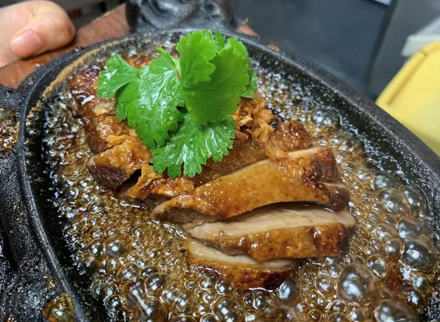 Traditional Thai dish being served